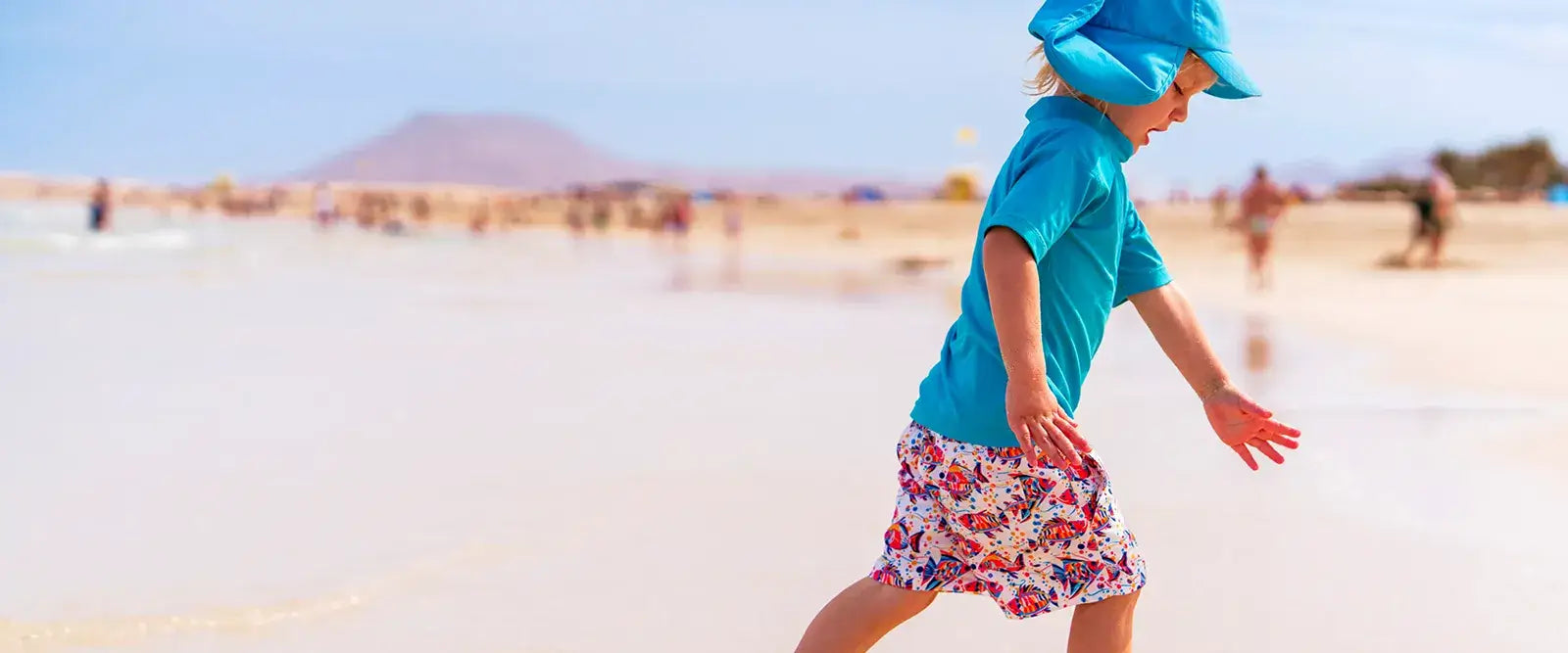 Nachhaltige Kinder-Badehose aus recyceltem Material – Modell Funky Fish von Noah*s Ocean.